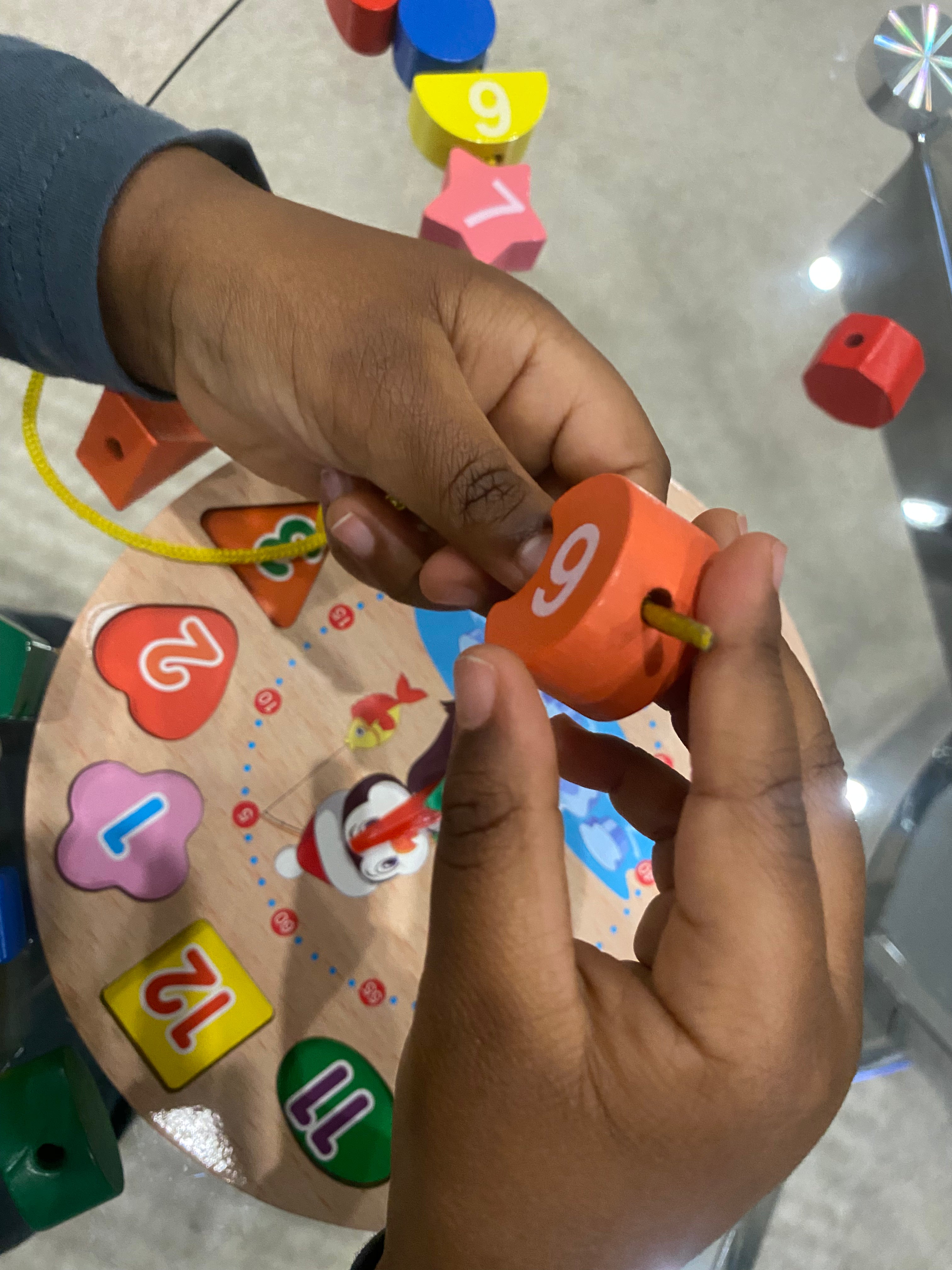 Jouet puzzle évolutif en bois